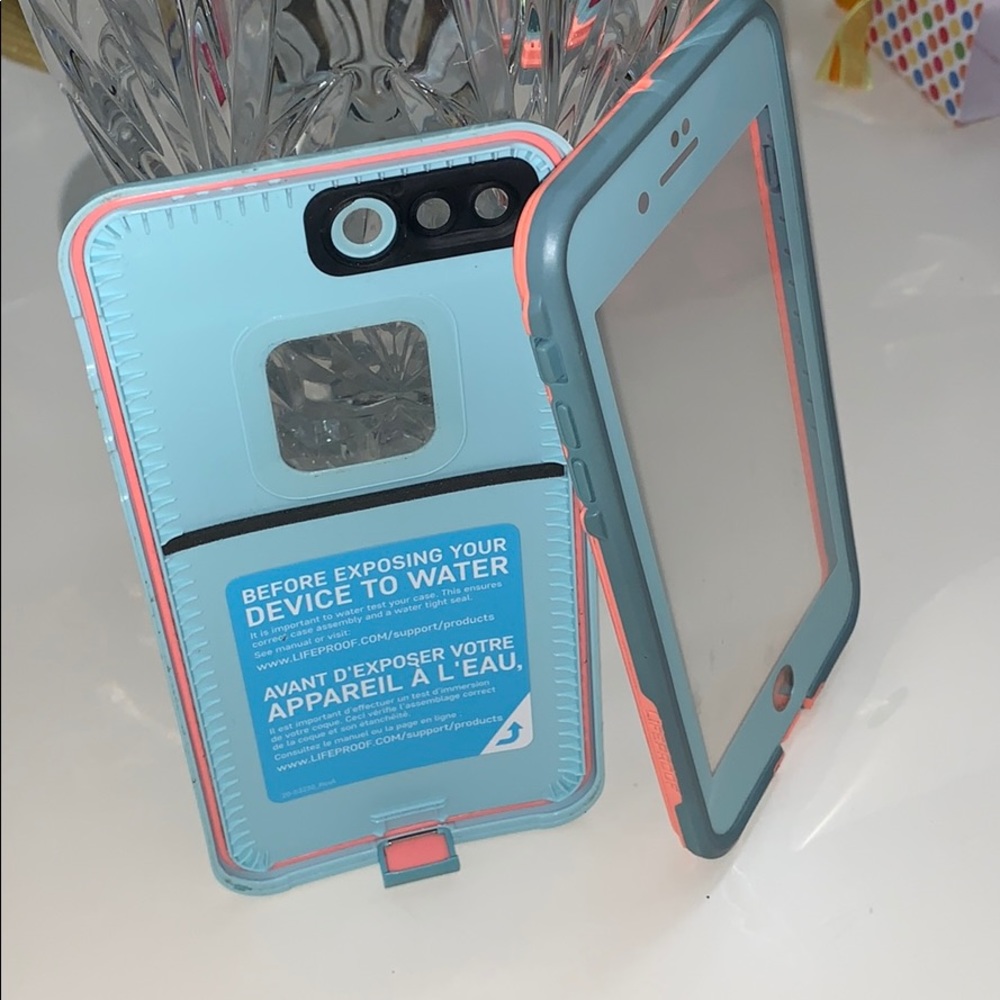 iPhone 8 Plus LIFEPROOF case. Teal and coral.